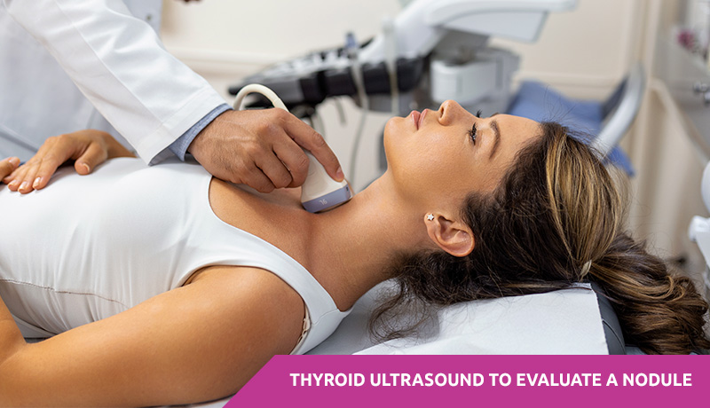 Woman having a thyroid ultrasound to evaluate a nodule